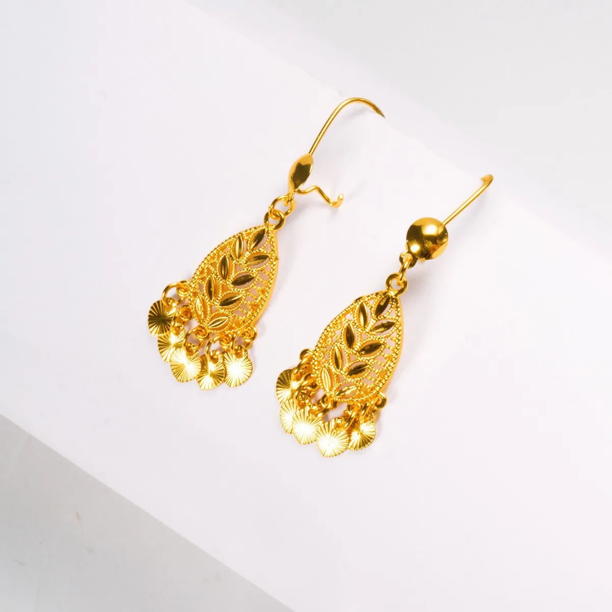 24K Pure Gold AU999 Leaf Tassel Earrings, swaying gracefully to showcase feminine charm and exude elegance