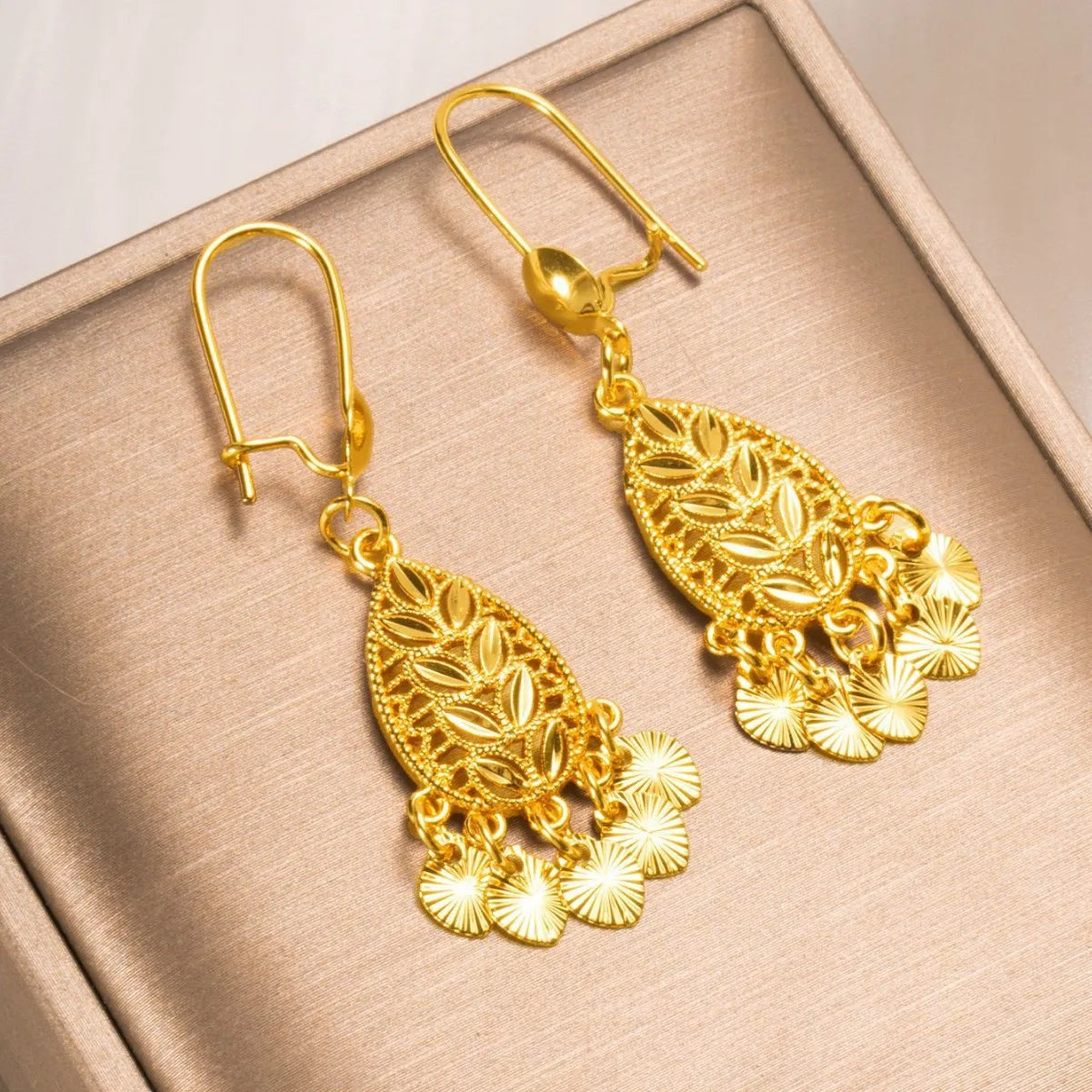 24K Pure Gold AU999 Leaf Tassel Earrings, swaying gracefully to showcase feminine charm and exude elegance